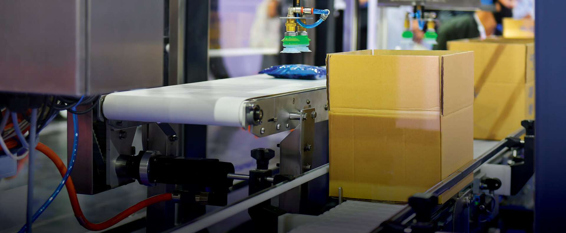 Photo - Boxes on a conveyor